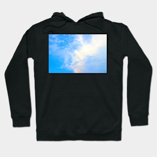 View of the sky split between puffy and thick clouds on the right and azure color on the left Hoodie